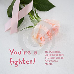 This october unite in support of breast cancer awareness month text with pink ribbon and rose