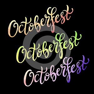 Octoberfest handwritten colorful watercolor lettering on black background.