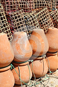 Octopus pots -pulperas- and plastic mesh pots for octopus fishing photo