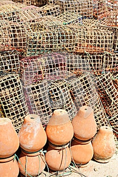 Octopus pots -pulperas- and plastic mesh pots for octopus fishing photo