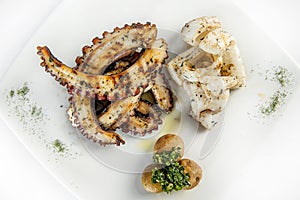 Octopus and squid grilled with vegetables.