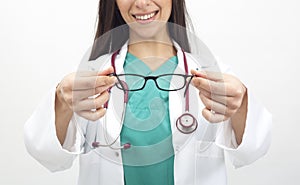 Oculist female giving glasses