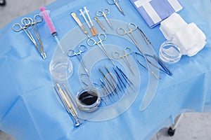 Oculoplastic and facial plastic surgery instruments on sterile blue drape