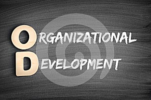 OD - Organizational Development acronym, business concept on blackboard