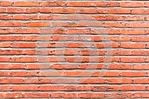 Od red brick wall texture background. bricked wall of orange color, wide vintage style