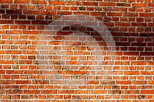 Od red brick wall texture background. bricked wall of orange color, wide vintage style
