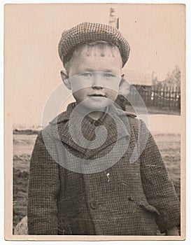 Od Soviet Black and white portrait photograph of a little boy.