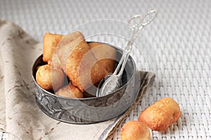 Odading Beignet, Indonesian Fried Bread with Sesame Seed on Wooden Background