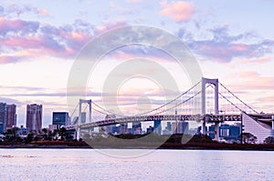 Odaiba Rainbow bridge with Tokyo bay view at evening sunset sky