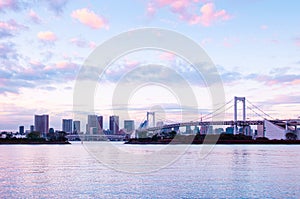 Odaiba Rainbow bridge with Tokyo bay view at evening sunset sky