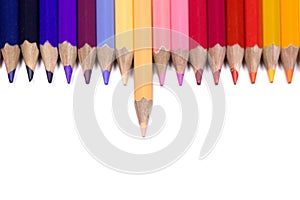 Odd One Out Color Pencil Facing Down on Pure White Background