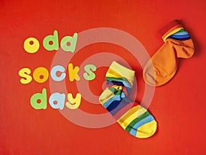 Odd Socks Day. Lonely Sock Day. The social problem of bullying. Strange socks as a symbol of Down syndrome
