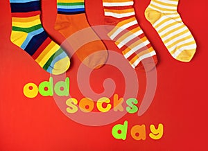 Odd Socks Day. Lonely Sock Day. The social problem of bullying. Strange socks as a symbol of Down syndrome