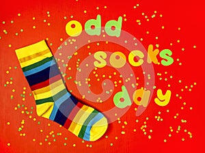 Odd Socks Day. Lonely Sock Day. The social problem of bullying. Strange socks as a symbol of Down syndrome