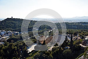 The Odeon of Herodes Atticus from Acropolis and Athens landscape , Greece photo