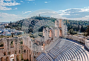 The Odeon of Herodes Atticus and the Filoppapos Hill in Athens, Greece