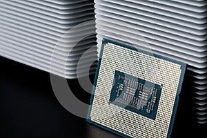 odern personal computer processor Ã¢â¬â CPU, white metal radiator for cooling it. Heat dissipation, thermal conductivity and photo