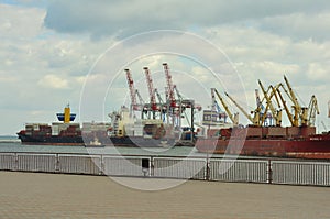 ODESA, UKRAINE - March 04. 2015. International Black Sea port in Odesa. Large cranes for loading cargo, grain for export