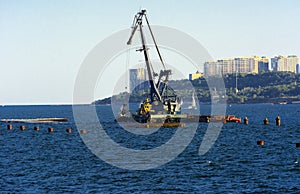 Odessa, Ukraine - August 8, 2018. Big working cranes for loading