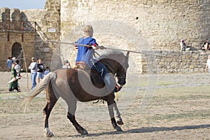 ODESSA, UKRAINE - JULY 20, 2019: Equestrian traditional competitions at knight`s festival in fortress Akkerman Belgorod-Dniester.