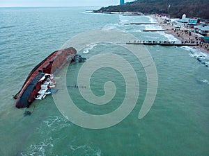 Odessa, Ukraine, November 22, 2019: Shipwreck. The ship crashed near the shore at sea. Cargo tanker. Port. Ecological