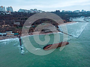 Odessa, Ukraine, November 22, 2019: Shipwreck. The ship crashed near the shore at sea. Cargo tanker. Port. Ecological