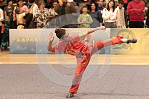 ODESSA, UKRAINE - October 1, 2019: Wushu athlete during the Wushu competition among children. Young athletes in competitions