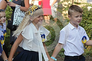 ODESSA UKRAINE - September 1, 2019: First call. 1 September is Day of Knowledge. Solemn school line, first grade, back to school.