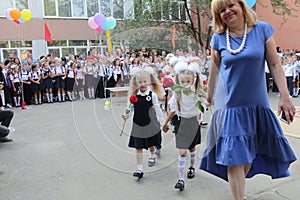 ODESSA UKRAINE - September 1, 2019: First call. 1 September is Day of Knowledge. Solemn school line, first grade, back to school.