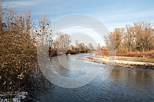 Odra river with view tower on tha background on czech-polish borders near Bohumin and Chalupki cities