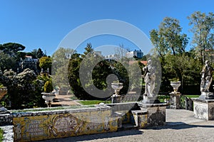 Oeiras, Lisboa PORTUGAL - 10 March 2019- Garden perspective of the Marquis of Pombal Palace, with old tiles and decorative statues