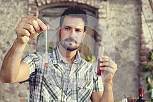 Oenology measuring the percentage of sugar of the wine