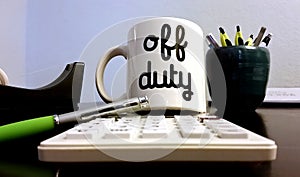 Off Duty Coffee Mug in Office