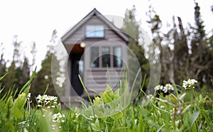 Off grid tiny house in the mountains photo