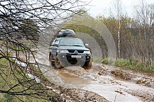 Off-road Action in the forest, 4x4, mud and vehicle