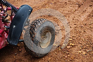 Off road buggy tire on dirt road