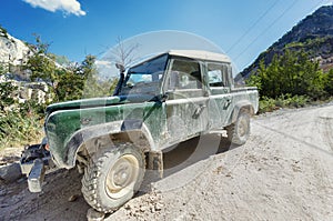 Off-road car in mountain way