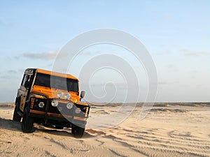 Off-road car in sand
