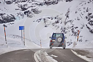 An off-road car transits the Bernina Pass in Switzerland