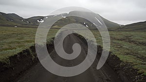 Off-road car vehicle drive on dirt road to Landmanalaugar on highlands Iceland.