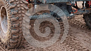 Off-road car wheels and marsh tires. Off-road and mud jeep tour and dirt road tires