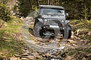 Off-road extreme expedition on black jeep wrangler photo