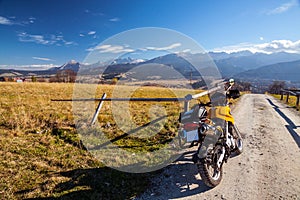 Off-road motorcycle in mountains scenery