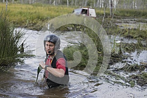 Off road sport, cars overcome the swamp