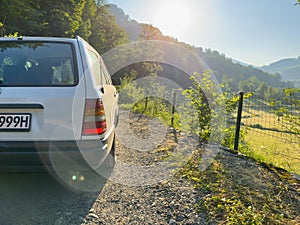 Off-road travel on mountain road. View from behind.