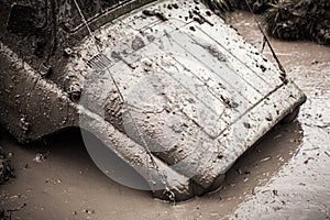Off-road Trophy car UAZ 469 stucks in deep mud.