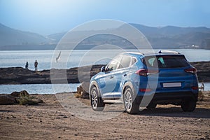 Off-road vehicle by the sea by the lagoon