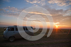 Off-road vehicles in remote region of Mongolia. Orkhon valley world heritage site photo