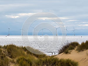 Off shore wind turbines in the sea off Formby Point Sefton Coast Merseyside