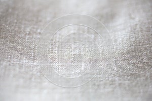 Off-white woven linen textile close-up